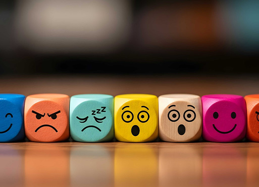 colorful wooden blocks with various facial expressions including angry sad surprised and happy ideal for teaching emotional awareness and social skills in activities for children 3 emotions