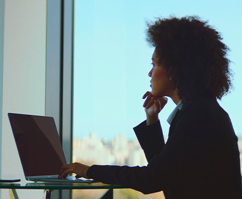 diverse team engaging in discussion around a table emphasizing collaboration and productivity in a business meeting setting